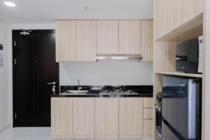Elegant 1BR Apartment at Casa De Parco near AEON Mall By Travelio