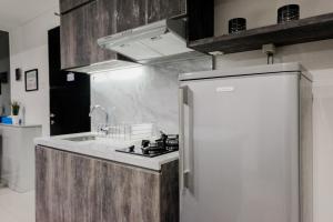 Bright 2BR Apartment at Paramount Skyline By Travelio