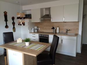 Апартамент Moderne-Ferienwohnung-in-ruhiger-Lage Квикборн Германия
