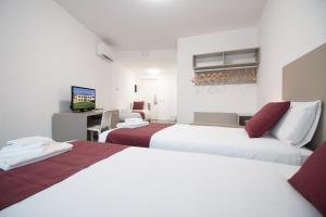 Triple Room with Balcony room in Hotel Cascina Fossata & Residence