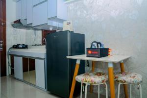 Cozy Studio with City View Signature Park Grande Apartment By Travelio