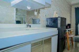 Cozy Studio with City View Signature Park Grande Apartment By Travelio