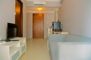 Good Deal 1BR Apartment Signature Park Grande MT Haryono By Travelio