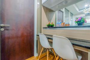 1BR Apartment Atlanta Residences next to RS Bunda Margonda By Travelio