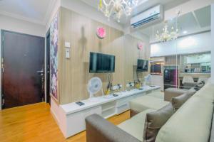 1BR Apartment Atlanta Residences next to RS Bunda Margonda By Travelio