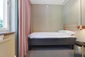 Superior Triple Room with City View room in Ersta Konferens & Hotell