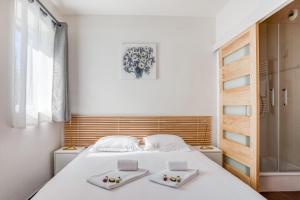 Appartements Lyon Confluence - Superbe pied a terre avec parking prive en option : photos des chambres