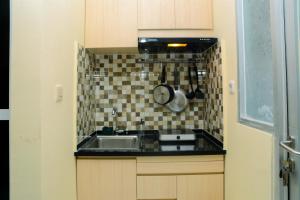 Chic and Cozy Studio Apartment at Menteng Square By Travelio