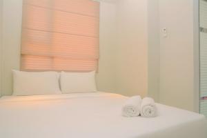 Homey Minimalist Studio Apartment at Menteng Square By Travelio