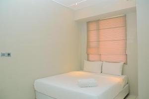 Homey Minimalist Studio Apartment at Menteng Square By Travelio