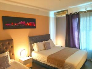 Hotels Hotel Bellevue Cannes : photos des chambres
