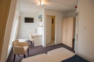 Twin Room with Sea View room in Hotel De Leugenaar