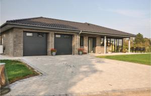 Four-Bedroom Holiday Home In Hesselager