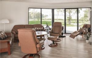 Four-Bedroom Holiday Home In Hesselager