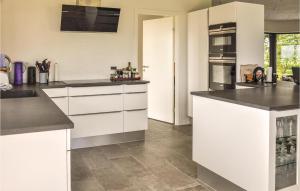 Four-Bedroom Holiday Home In Hesselager