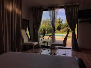 Appartements Suite luxe vue sur piscine et parc : photos des chambres
