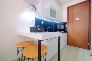 Modern and Simple Studio Signature Park Grande Apartment By Travelio