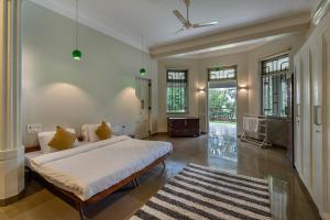 SaffronStays Odeon - 4BR heritage art deco villa with cantilever pool, verandahs & forested lawns