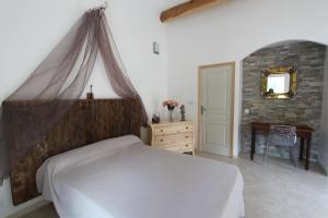 Maisons de vacances A MANDRIA, appartements avec cuisine 30m2, patio, vue Montagnes et citadelle, 5 minutes a pied du centre ville et des rivieres : photos des chambres