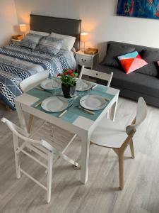 Appartements Charmant studio avec climatisation et parking : photos des chambres