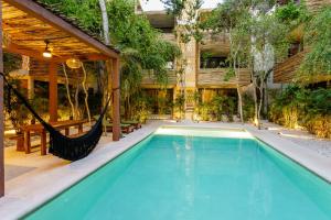 Eco-sustainable Luxury Between Beach Hotspots & Tulum Town by Stella Rentals