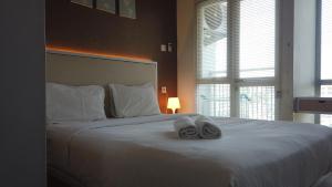 Cozy Studio near UNPAD at Taman Melati Apartment Jatinangor By Travelio