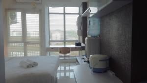 Cozy Studio near UNPAD at Taman Melati Apartment Jatinangor By Travelio