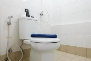 Pleasant 2BR Apartment at Bassura City near Shopping Mall By Travelio