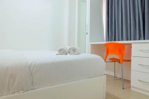 Pleasant 2BR Apartment at Bassura City near Shopping Mall By Travelio