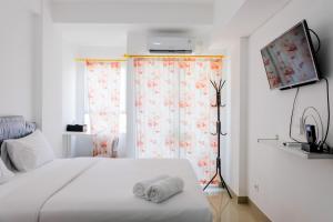 Comfortable and Fully Furnished Studio at Poris 88 Apartment By Travelio