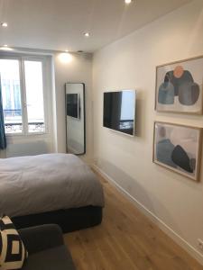 Appartements Studio design proche Champs-Elysees : photos des chambres