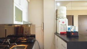 Trendy & Relaxing 2BR at The Suite Metro Apartment By Travelio