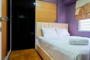 Compact and Comfy 2BR Bassura City Apartment By Travelio