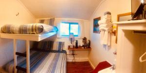 Inn - European Style Room #2 (Shared Bath) 1 double bed with twin bunk above (upstairs) room in Driftwood Inn