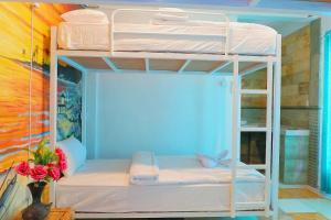 Giường trong Phòng ngủ tập thể 4 người (Bed in 4-Bed Dormitory Room)