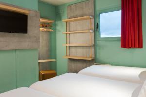 Hotels ibis budget Chilly-Mazarin Les Champarts : photos des chambres