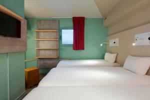 Hotels ibis budget Chilly-Mazarin Les Champarts : Chambre Triple avec 3 Lits Simples