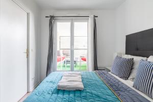 Appartement spacieux avec terrasse près de Paris et du Stade de France