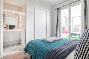 Appartements Appartement spacieux avec terrasse pres de Paris et du Stade de France : photos des chambres