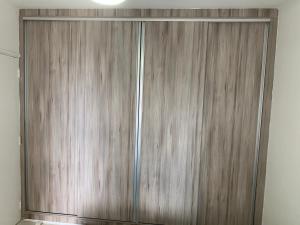 São Vicente Itararé prédio frente mar apto fundo vista parcial