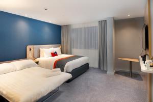 Standard Double Room with Single Sofa Bed and Free Hot Breakfast room in Holiday Inn Express - London Heathrow T4 an IHG Hotel