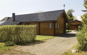 Four-Bedroom Holiday Home In Hesselager