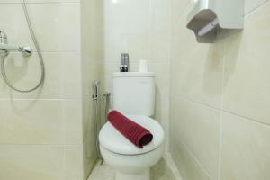 Fully Furnished Studio No Kitchen Apartment at Mustika Golf Residence By Travelio