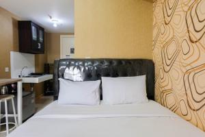 Luxury and Cozy Studio Apartment M-Town Residence By Travelio