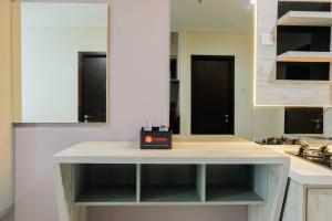 Cozy 1BR Apartment at Brooklyn Alam Sutera near IKEA By Travelio
