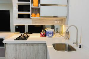 Cozy 1BR Apartment at Brooklyn Alam Sutera near IKEA By Travelio