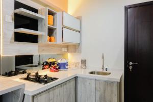 Cozy 1BR Apartment at Brooklyn Alam Sutera near IKEA By Travelio