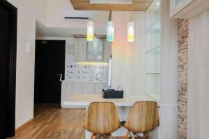 Comfy 1BR Apartment Casa De Parco Central BSD City By Travelio