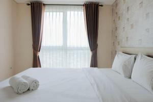 Comfy 1BR Apartment Casa De Parco Central BSD City By Travelio