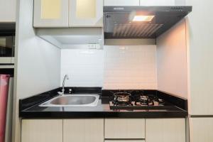 Elegant Studio Room at Springlake Summarecon Apartment By Travelio